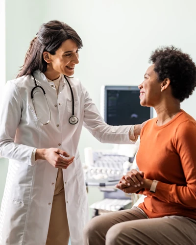 Doctor speaking with a patient